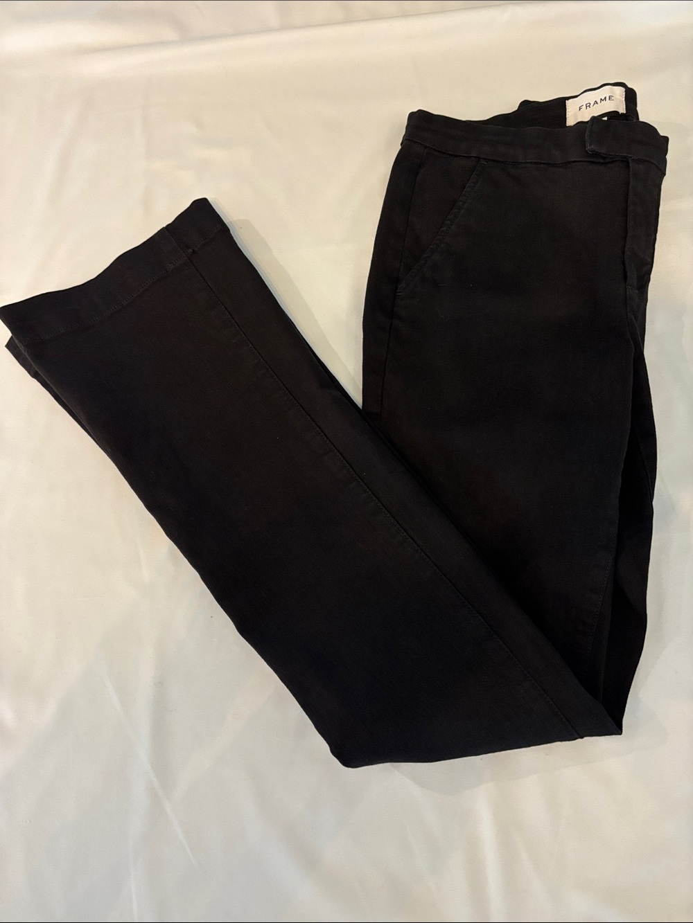FRAME Black stretchy straight-leg jeans.
Women’s size 28 - long